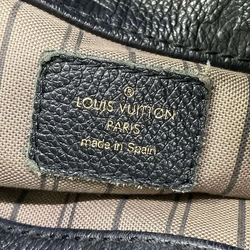 Louis Vuitton Artsy MM Monogram Empreinte Handbag M41066